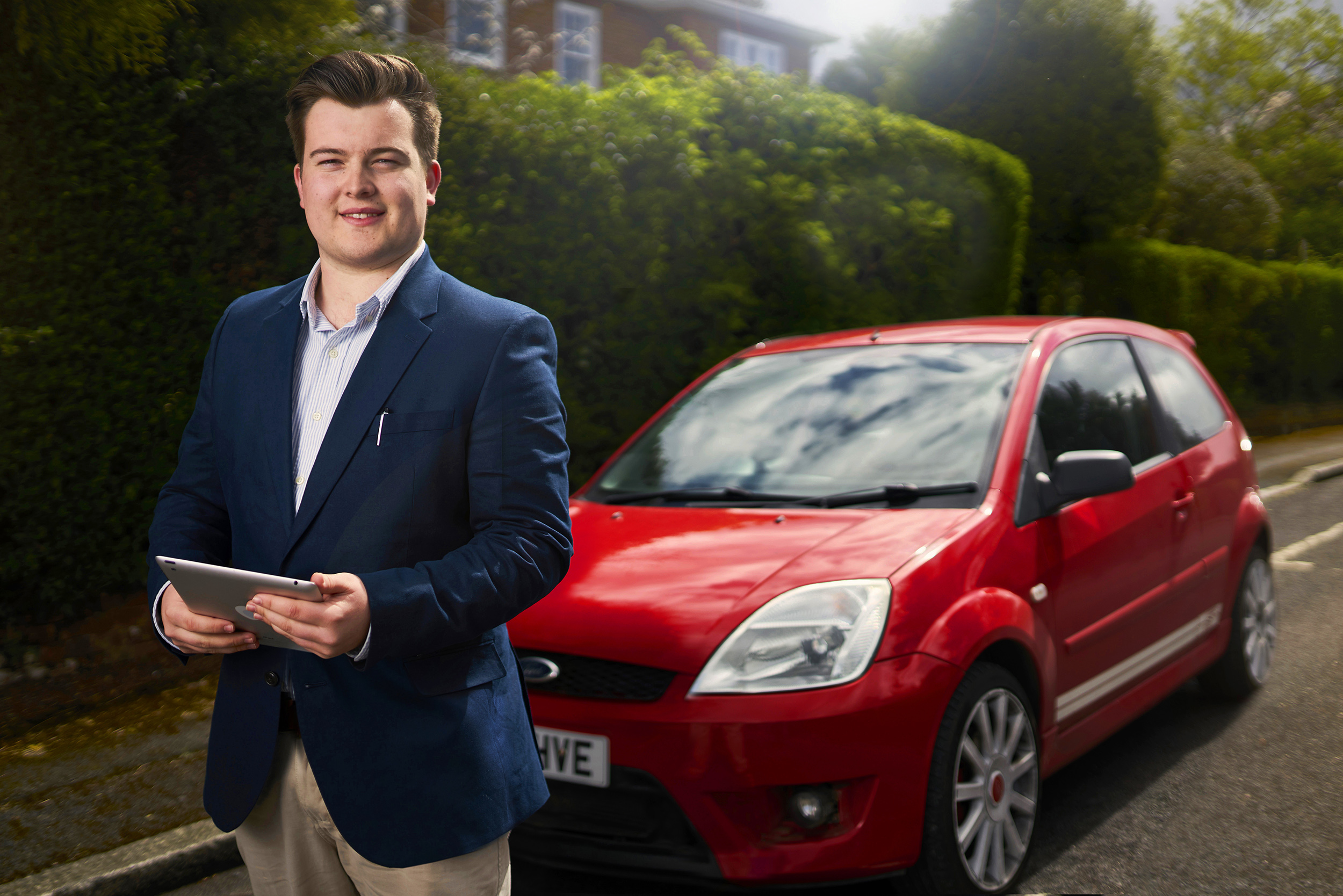 George Howell, founder of Ideal First Car, photographed in Exeter, Devon, 26 April 2018. Photo by Bristol photographer Adam Gasson / adamgasson.com Edit Note: Pre-saturated final high res image