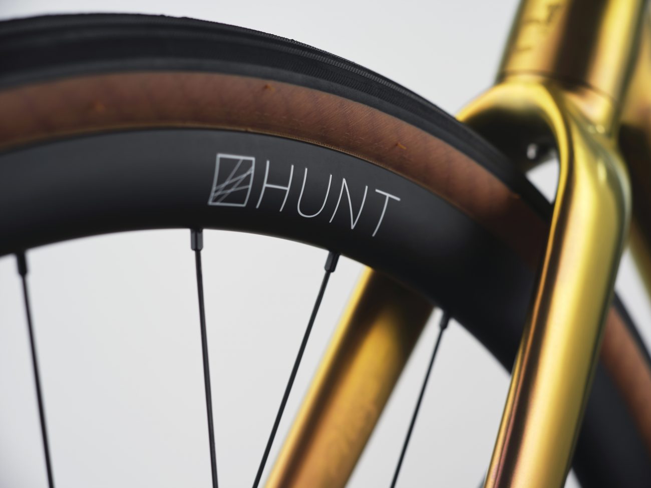 Detail of a Sturdy Cycles titanium bike with Hunt wheels