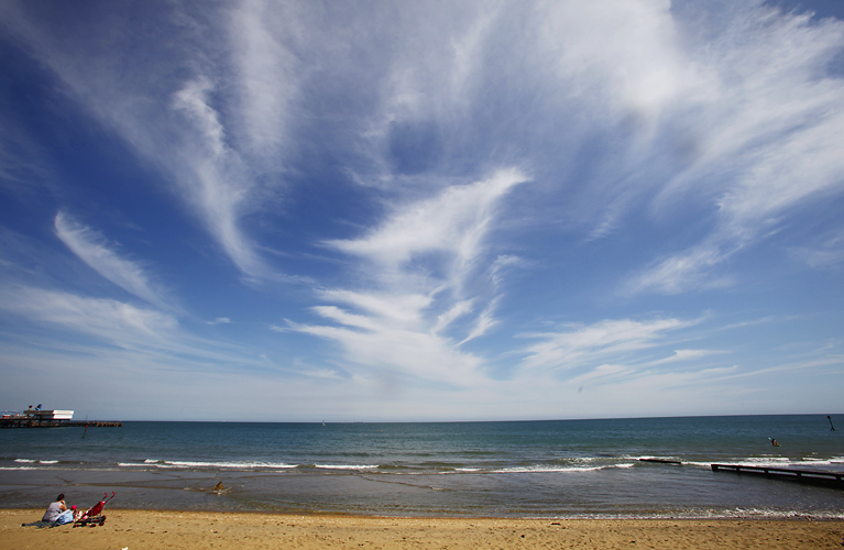 High level clouds over Sandown, Isle of Wight by Adam Gasson