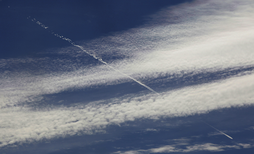 Contrails over Bristol by Adam Gasson