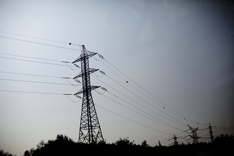 Electricity pylons outside of Jerusalem, Israel by Adam Gasson.