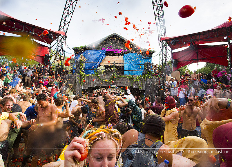 Glastonbury Festival tomato fight. Photo by Adam Gasson / adamgasson.com