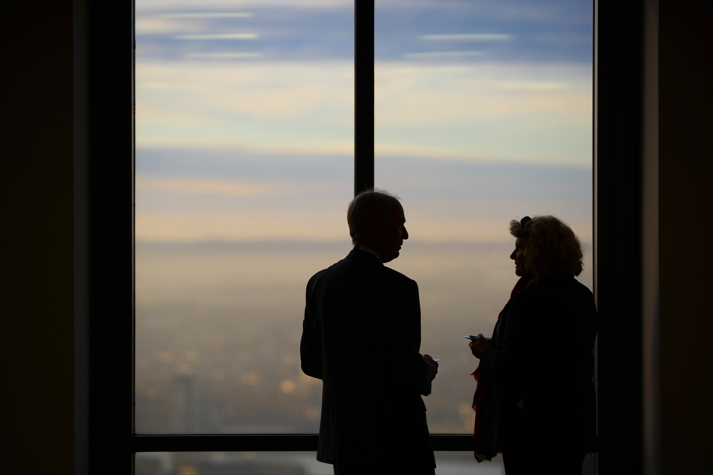 Silhouettes of two people at the OBN BioSeed event in London