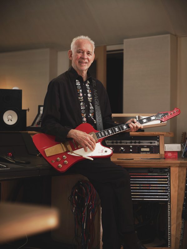 Photograph of Phil Manzanera in his studio in London.
